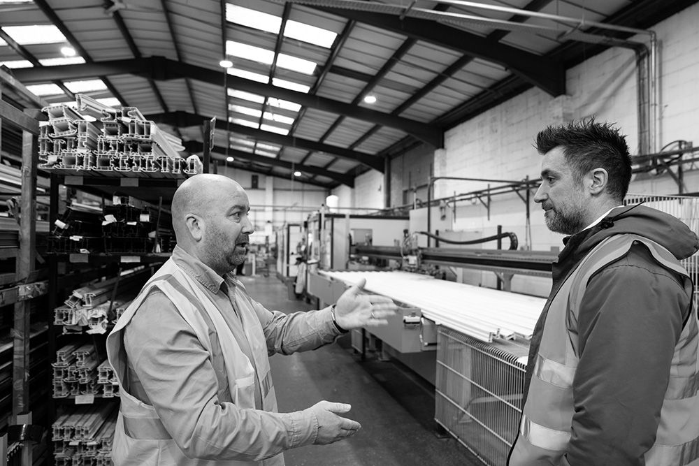 Workers talking in the factory