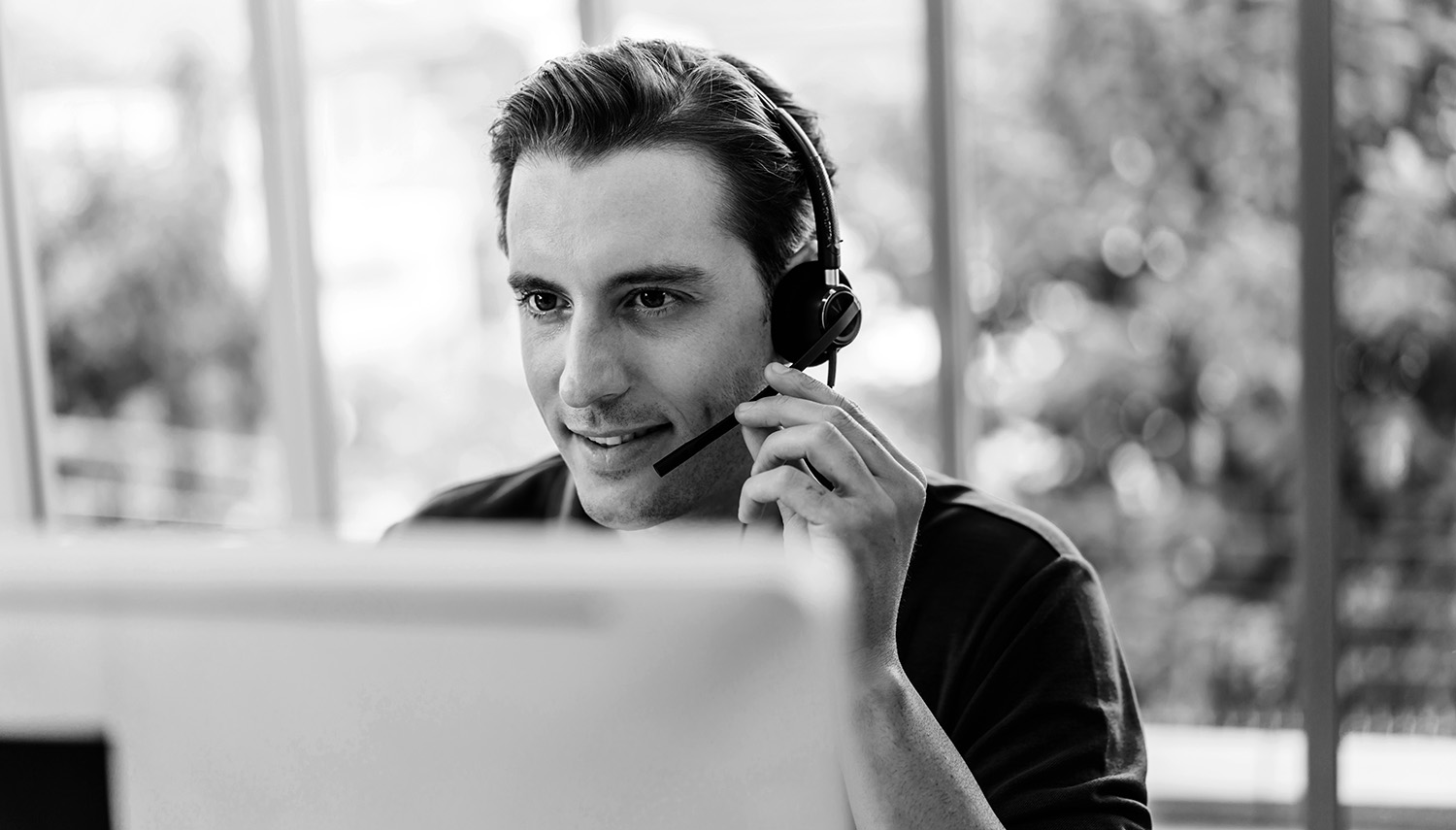 Happy call center smiling businessman operator customer support