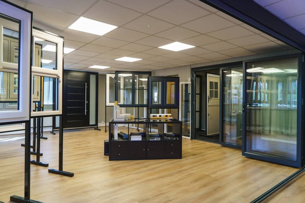 DL Window Systems Showroom featuring different window styles and colours and bifold doors